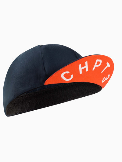 CHPT3 cotton cycling cap in Outer Space blue with peak showing in Fire red #color_outer-space-blue