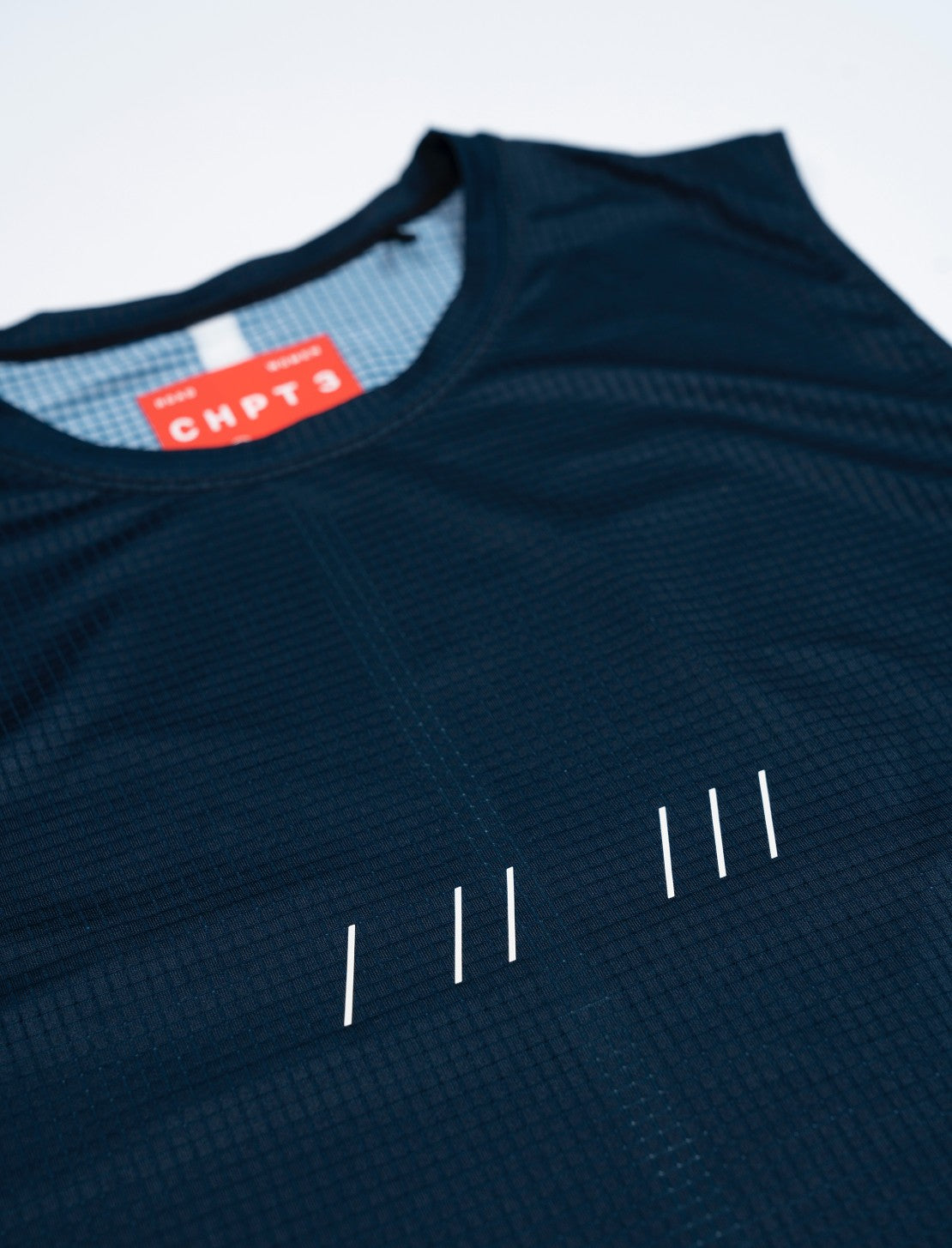 Women's sleeveless training top in Outer Space Blue #color_outer-space-blue