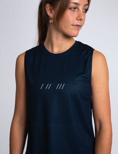 Women's sleeveless training top in Outer Space Blue #color_outer-space-blue