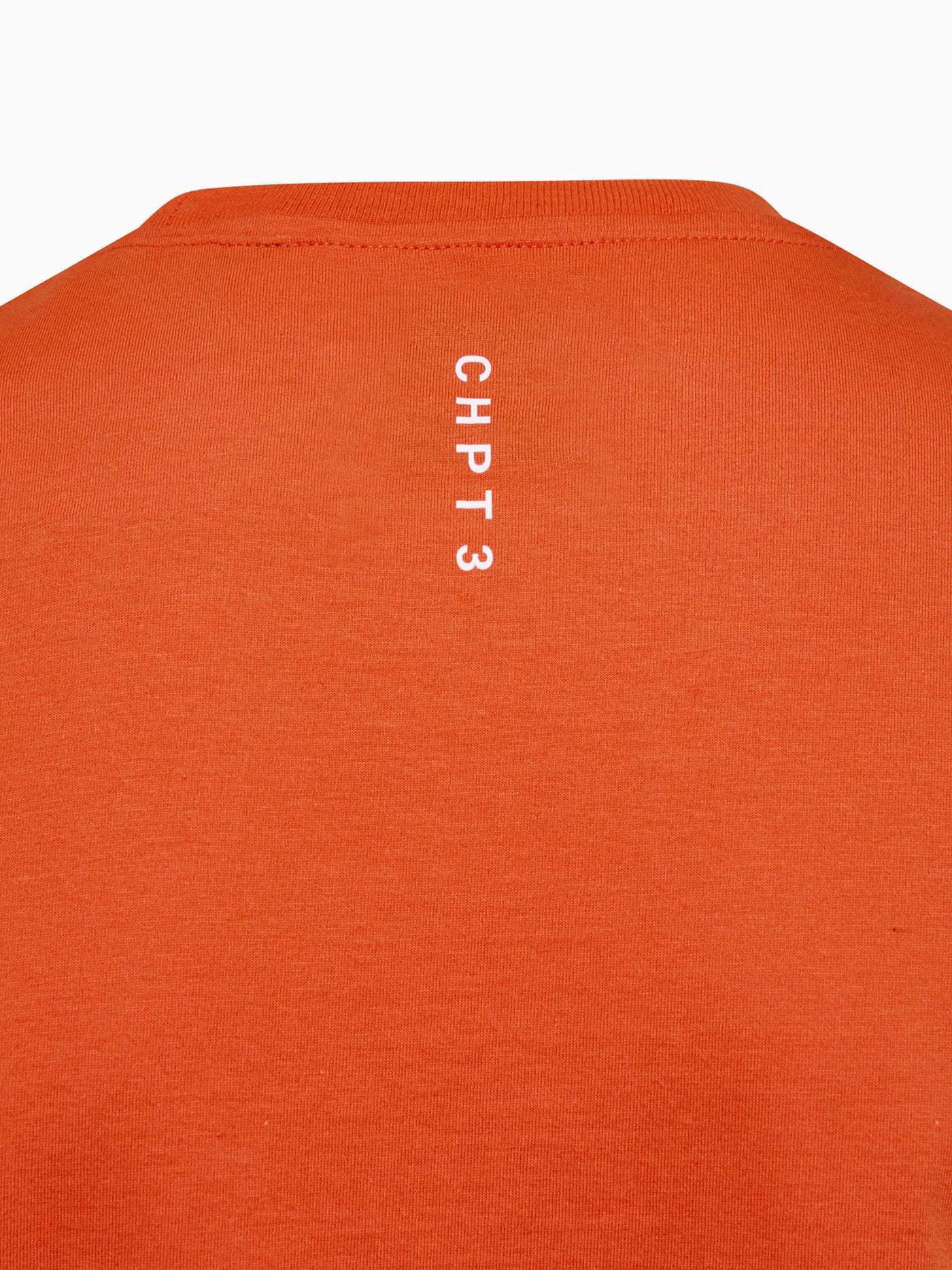 CHPT3 Elysée men's organic cotton t-shirt in colour Fire red, close up showing print detail #color_fire-red