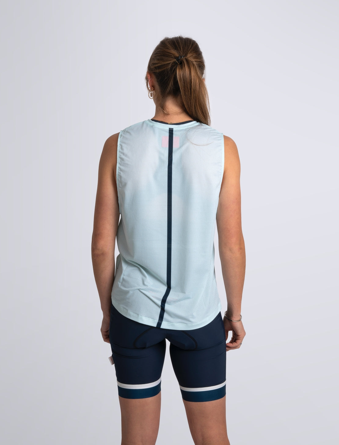 Women's sleeveless training top in Skylight Blue #color_skylight-blue
