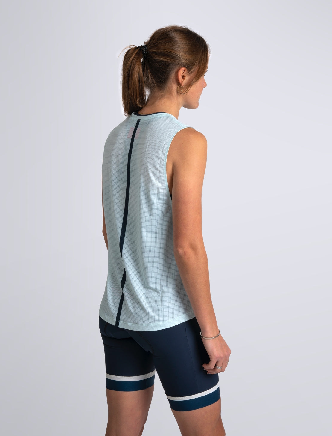 Women's sleeveless training top in Skylight Blue #color_skylight-blue